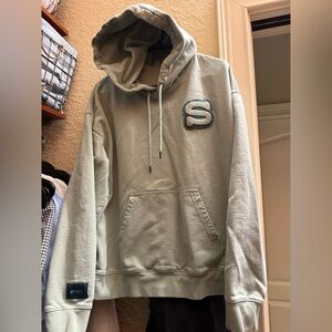 Stori by Katy Hearn- Green Hoodie with Embroidered S.